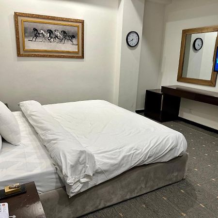 Mudan Hotel Islamabad Bagian luar foto