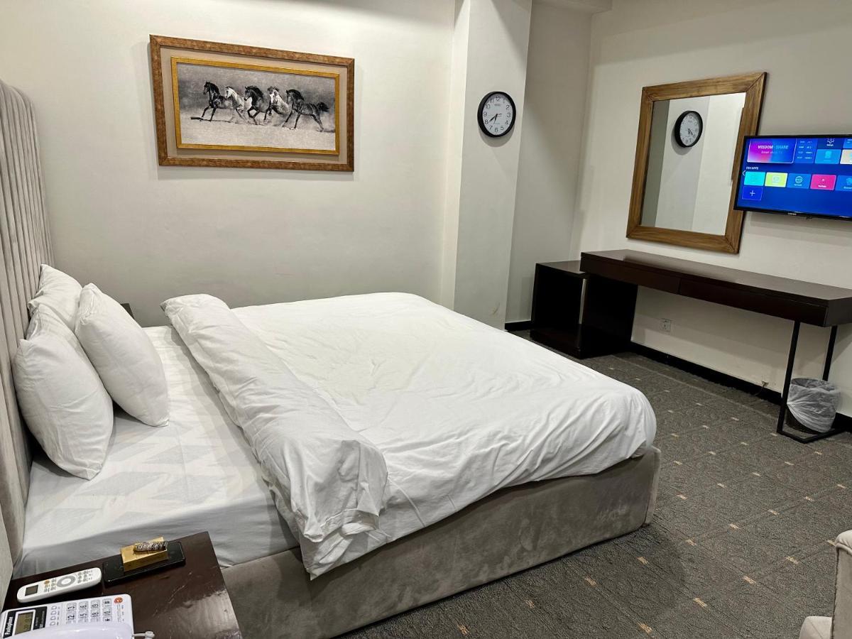 Mudan Hotel Islamabad Bagian luar foto