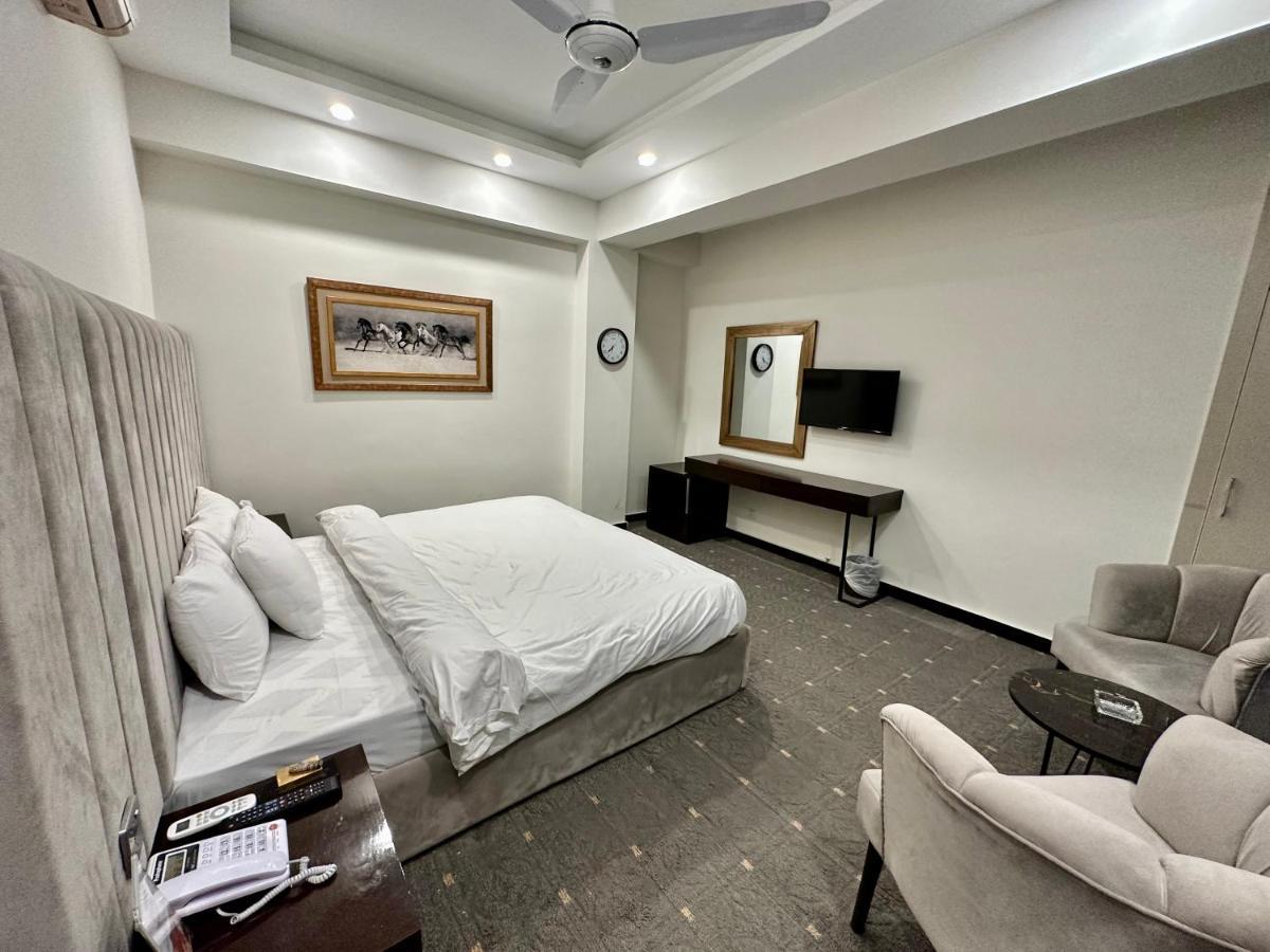 Mudan Hotel Islamabad Bagian luar foto