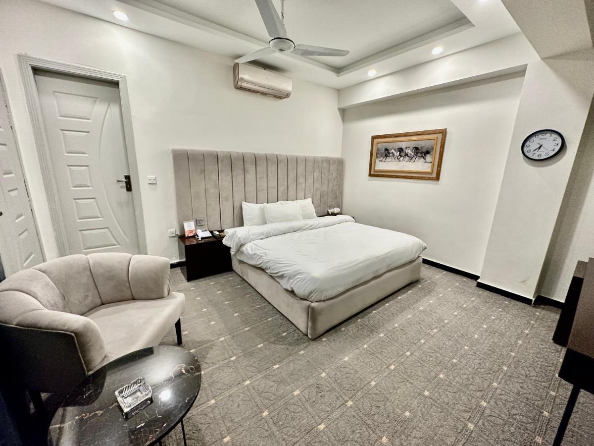 Mudan Hotel Islamabad Bagian luar foto
