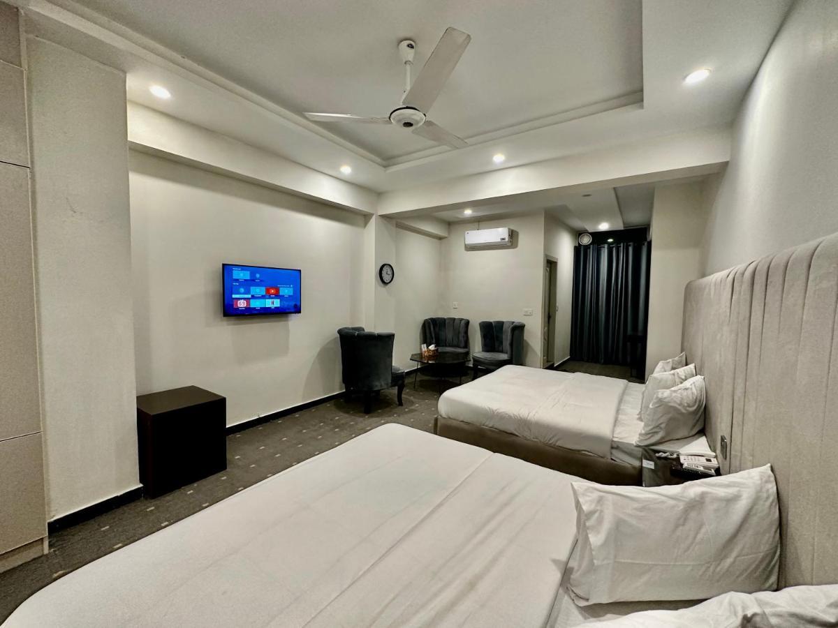 Mudan Hotel Islamabad Bagian luar foto