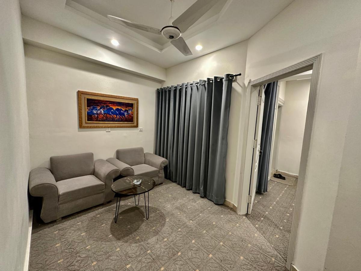 Mudan Hotel Islamabad Bagian luar foto