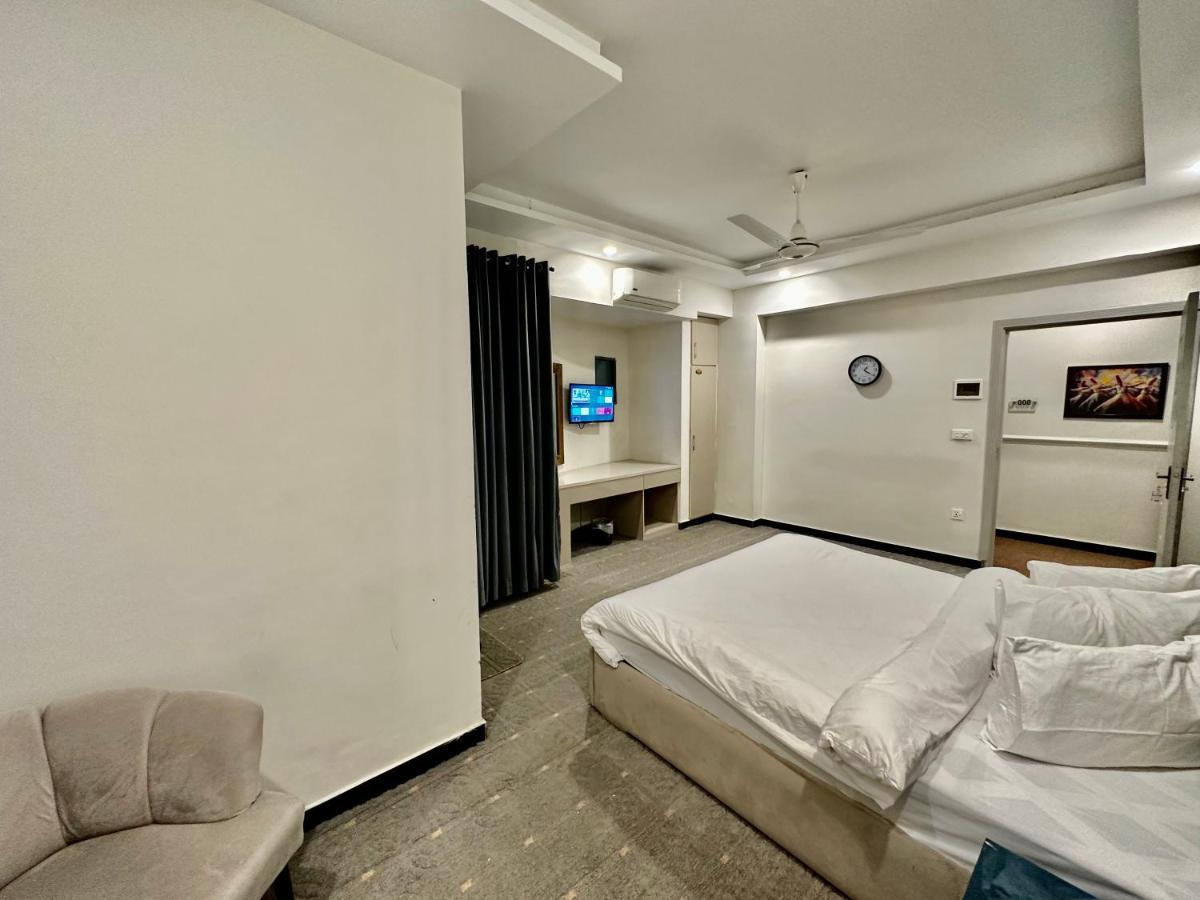 Mudan Hotel Islamabad Bagian luar foto
