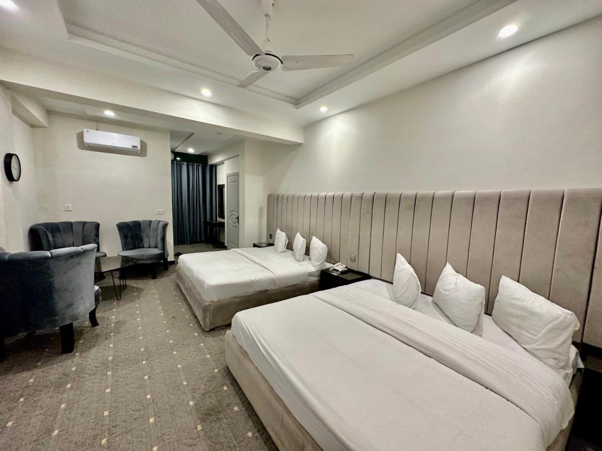Mudan Hotel Islamabad Bagian luar foto