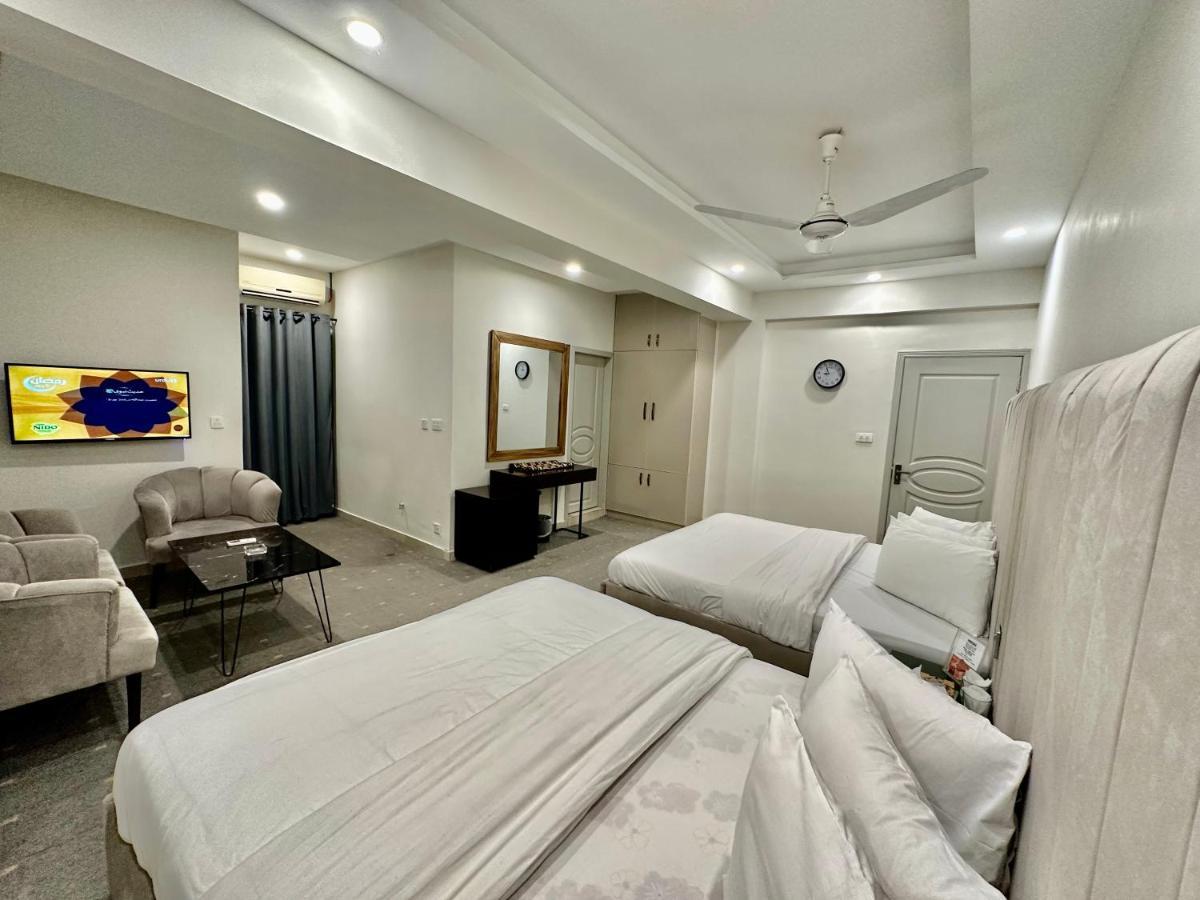 Mudan Hotel Islamabad Bagian luar foto