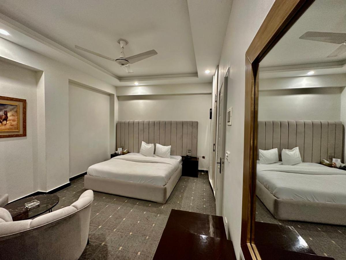 Mudan Hotel Islamabad Bagian luar foto