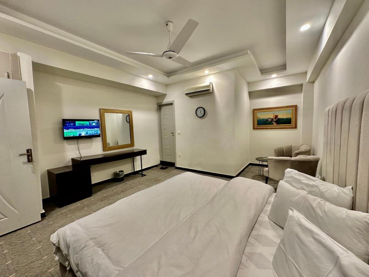 Mudan Hotel Islamabad Bagian luar foto