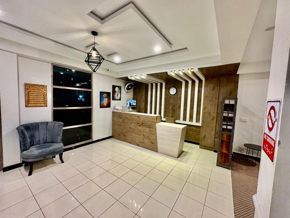 Mudan Hotel Islamabad Bagian luar foto
