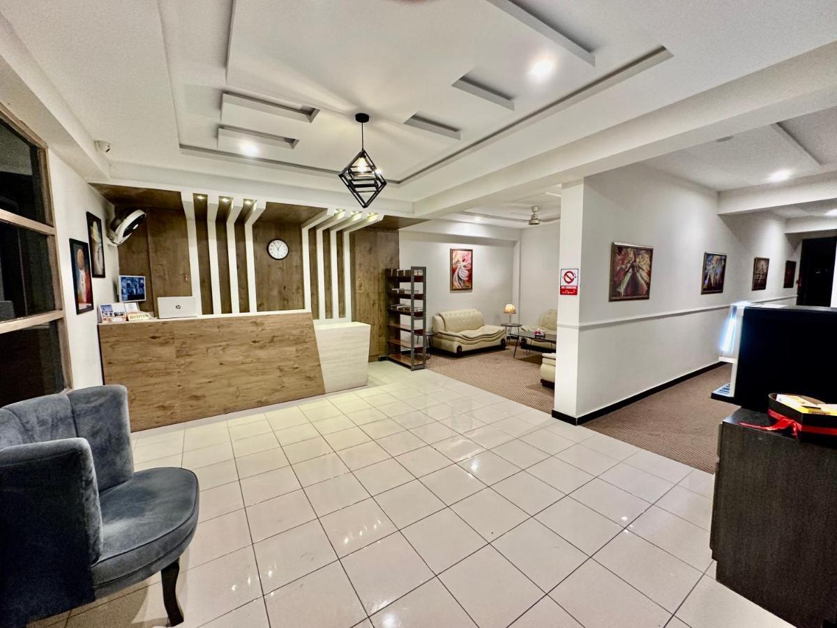 Mudan Hotel Islamabad Bagian luar foto