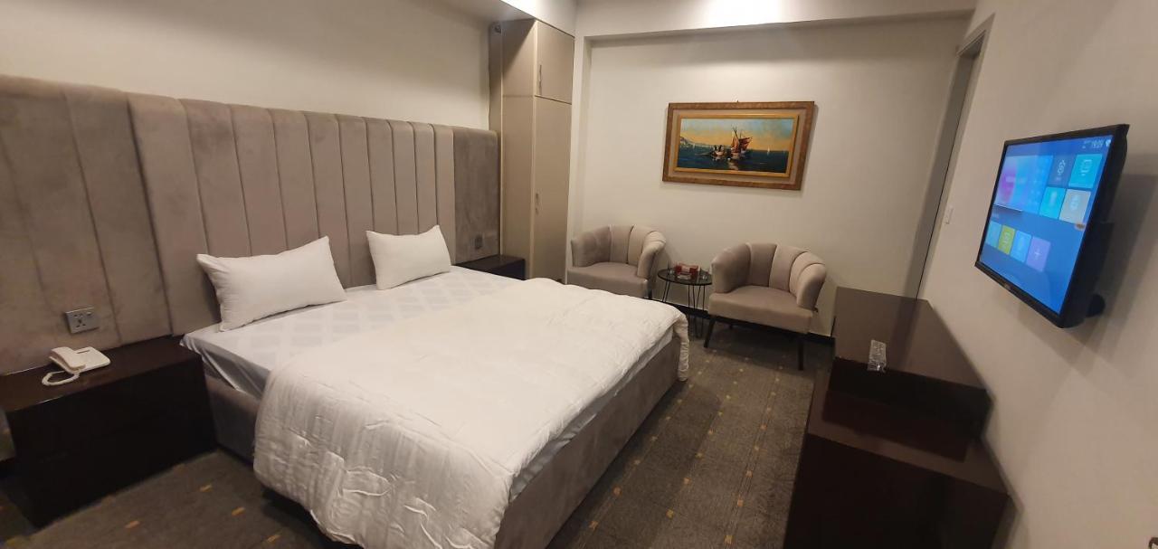 Mudan Hotel Islamabad Bagian luar foto