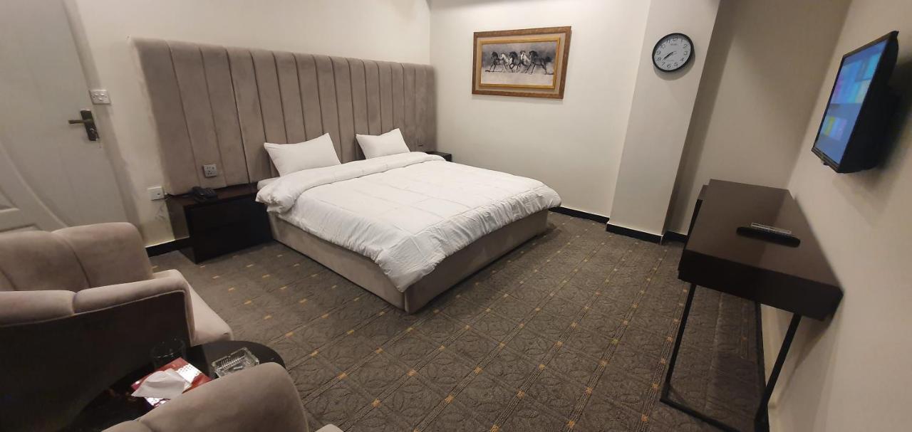 Mudan Hotel Islamabad Bagian luar foto