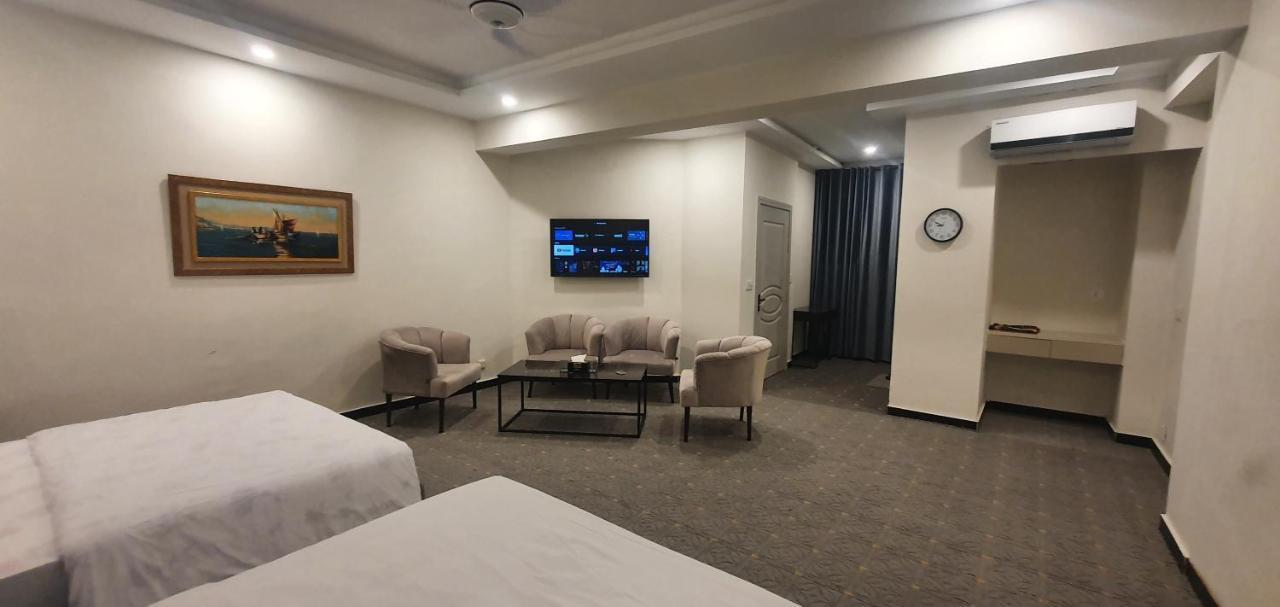 Mudan Hotel Islamabad Bagian luar foto