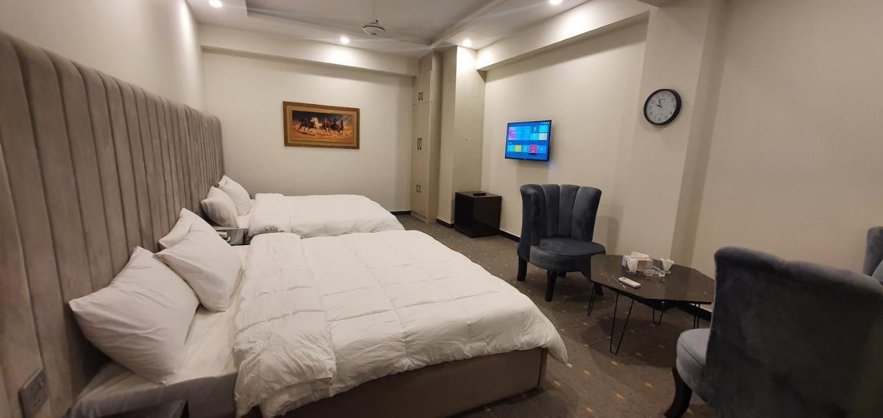 Mudan Hotel Islamabad Bagian luar foto