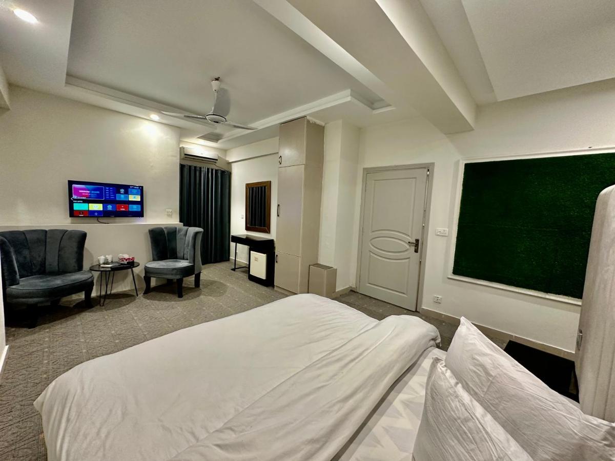 Mudan Hotel Islamabad Bagian luar foto