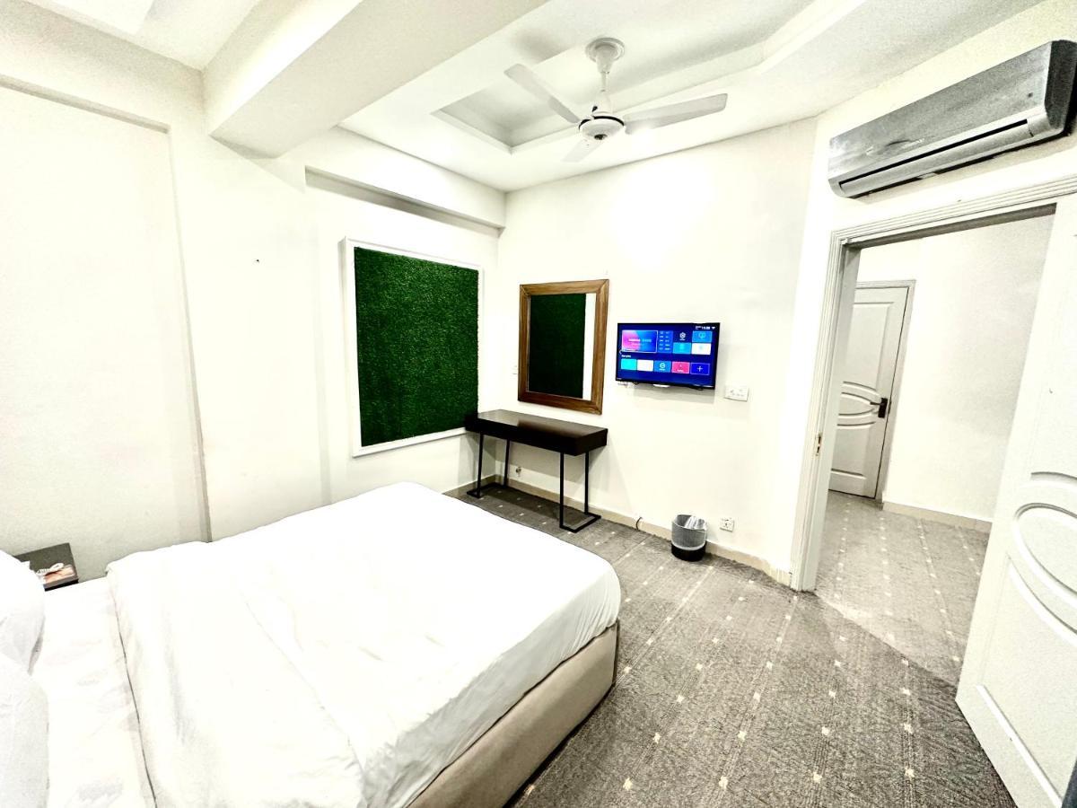 Mudan Hotel Islamabad Ruang foto